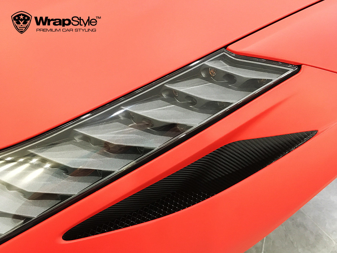 Partial Matte Black Vinyl Wrap on Red Ferrari 458 Italia